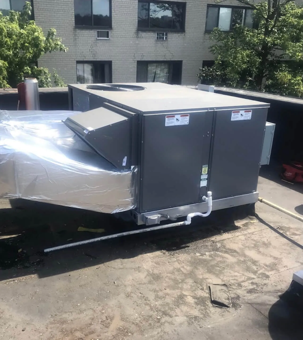 Commercial rooftop HVAC unit on a flat roof
