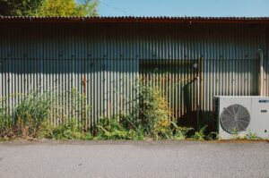 well-maintained outdoor HVAC unit in a New Jersey backyard - how often should you service your hvac